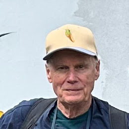 Peter Paré - Emeritus professor of respiratory medicine wearing a cap and green shirt outdoors